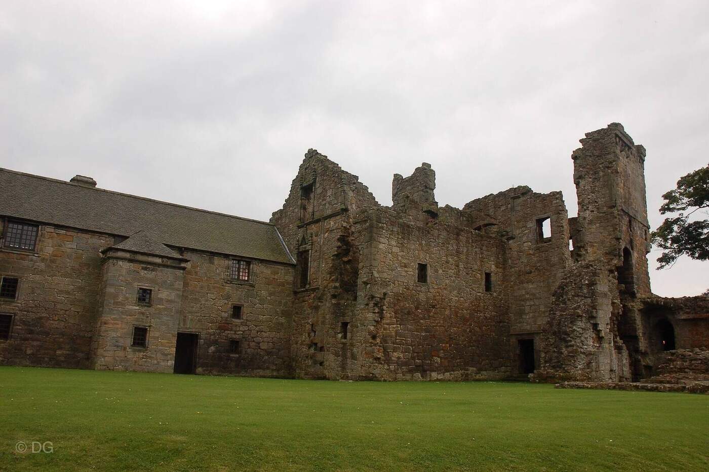 Aberdour Castle ruins beside the roofed stone wing