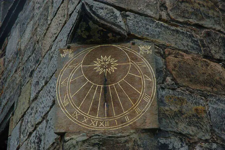 Carved sundial with Roman numerals at Aberdour Castle