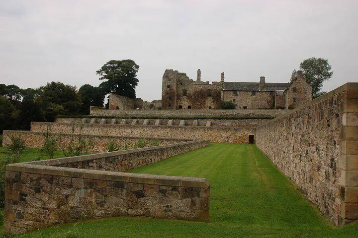 Stone-walled garden terraces beneath Aberdour Castle