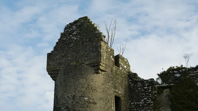 Auchans Castle rounded corner tower topped by a broken gable