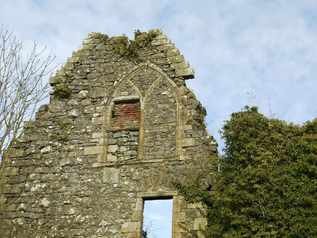Pointed stone window surround beneath Auchans Castle broken gable
