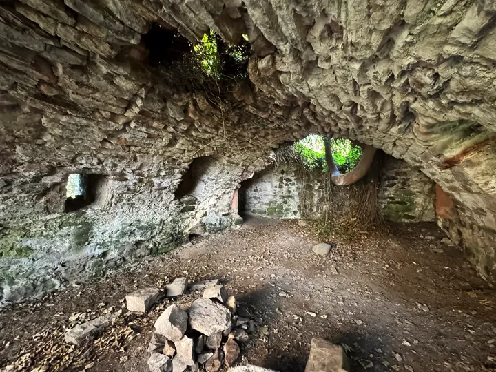 Damaged stone vault with daylight through openings at Auldhame Castle