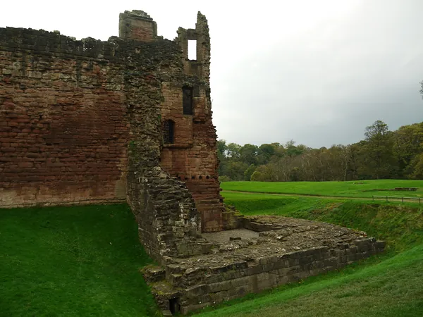 Ruined corner tower and stone foundations at Bothwell Castle