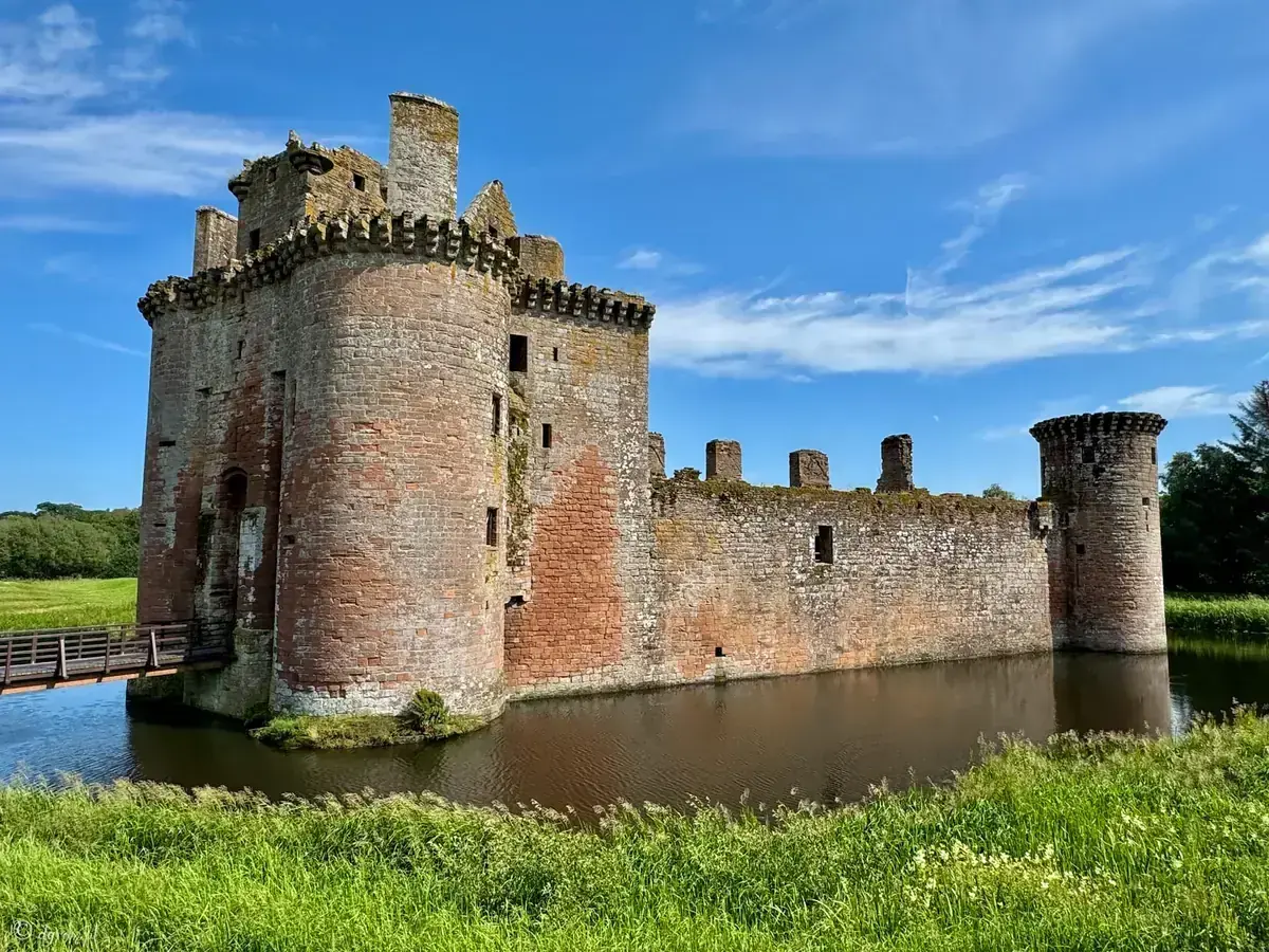 Caerlaverock Castle towers and walls surrounded by a moat