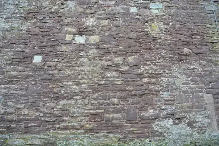Close view of Doune Castle's weathered stone masonry