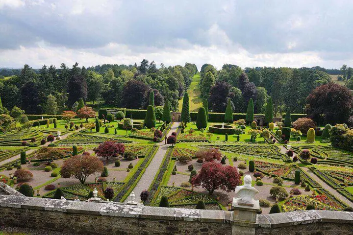 Symmetrical paths and hedges in Drummond Castle gardens viewed from above