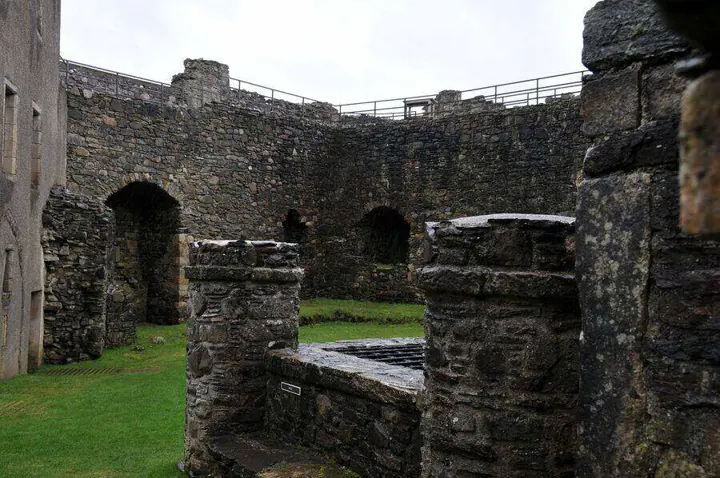 Circular stone structure and arched openings inside Dunstaffnage Castle