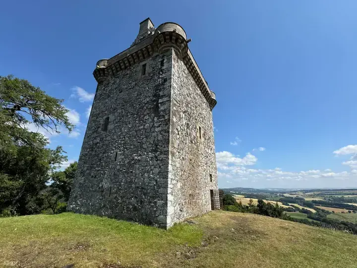 Low-angle view of Fatlips Castle tower and projecting parapet