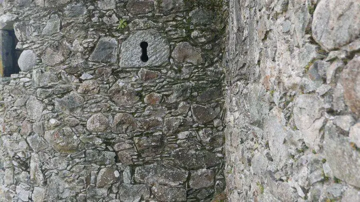 Small opening in rough stone walls at Kilchurn Castle