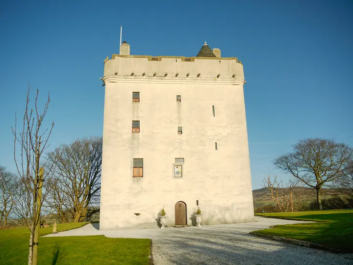 Law Castle entrance at the end of a gravel drive