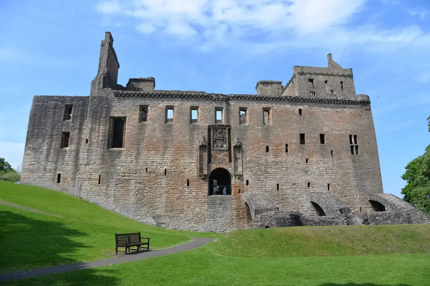 Linlithgow Palace façade and entrance viewed across the grass