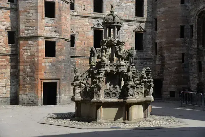 Ornate stone fountain in the courtyard of Linlithgow Palace