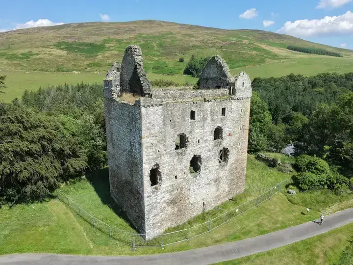 Aerial view of Newark Castle with wooded hills behind