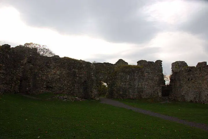 Grassy courtyard and roofless walls of Old Inverlochy Castle