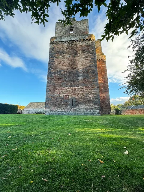 Preston Tower across the lawn, framed by trees