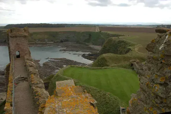 Tantallon Castle courtyard and rocky bay viewed from the walls
