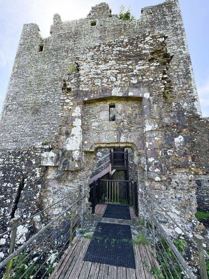Raised doorway of Threave Castle reached by a narrow wooden bridge